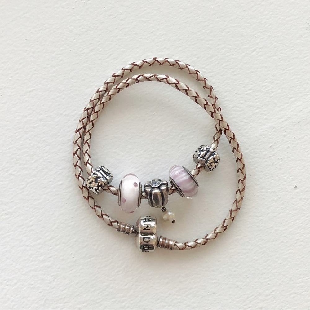 Pandora bracelet with 5 charms including 2 spacers
